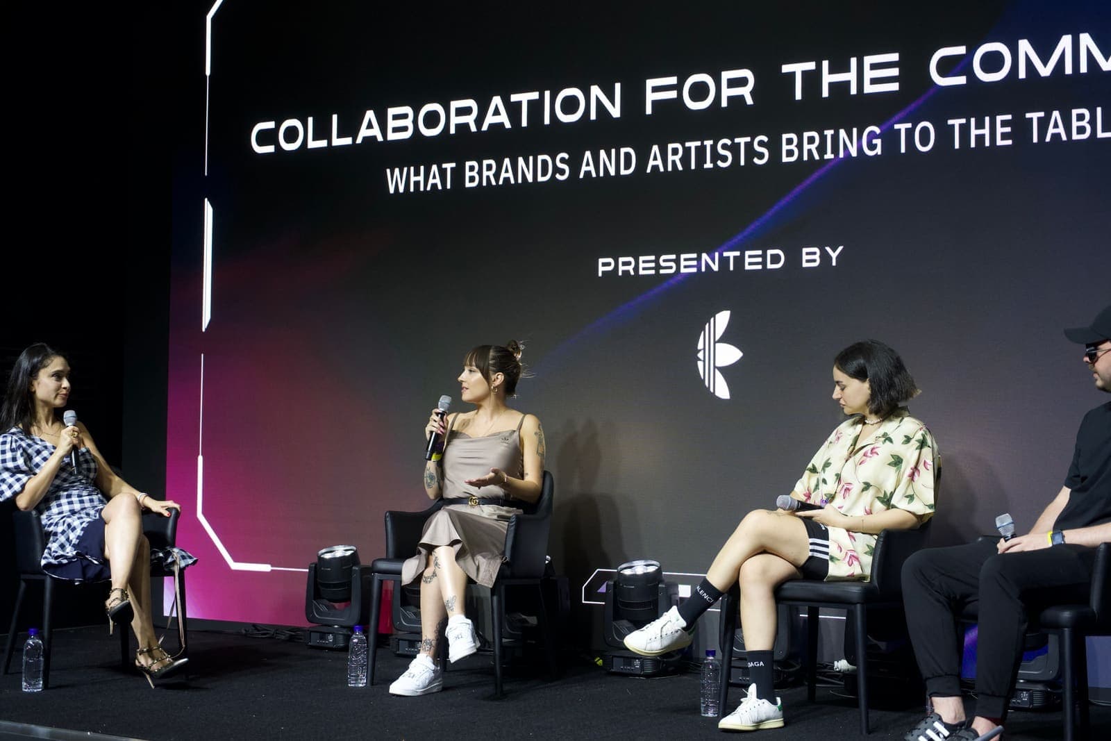 Four people on a panel about brand and artist collaborations, on stage at S-Factory in Seongsu