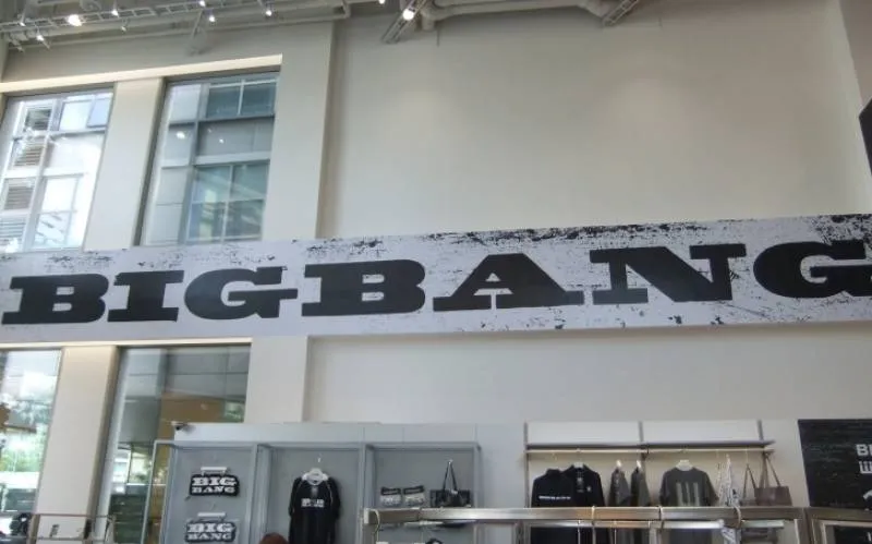 Pop-up store under a large BIGBANG sign