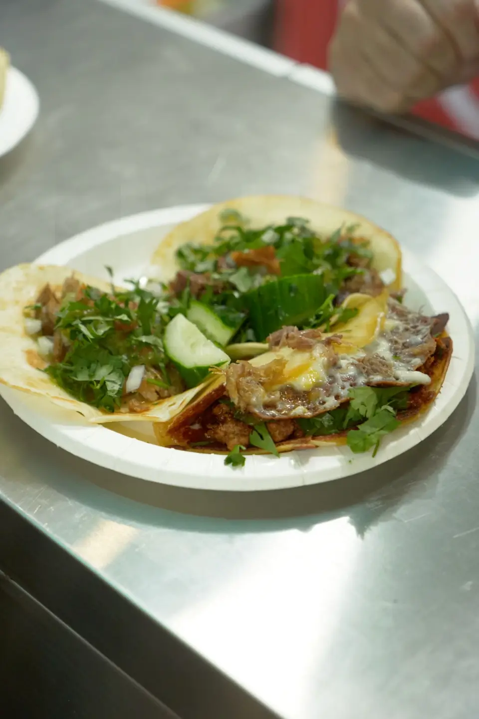 Tacos on a white plate